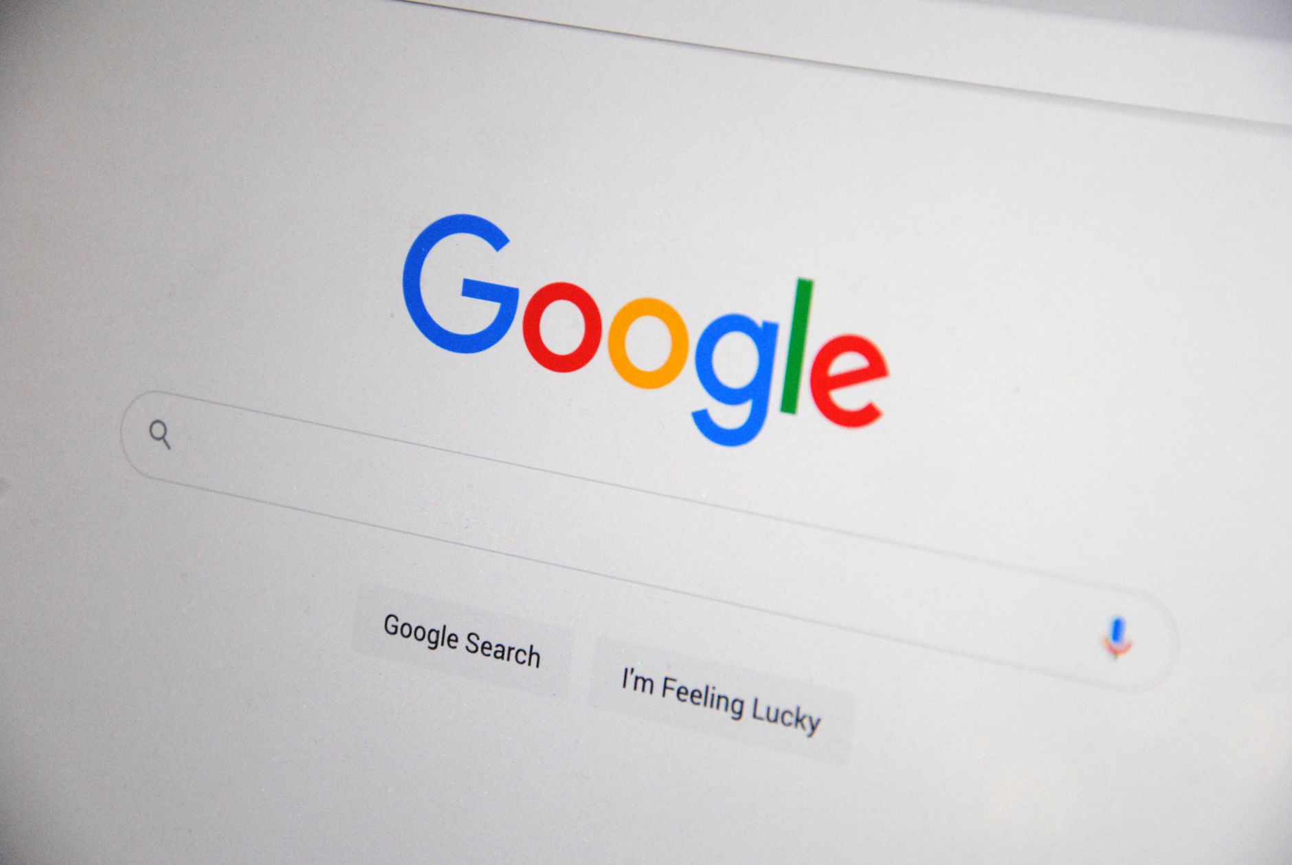 Gemini 2.5 Pro Review 2026: Is Google's AI Finally Better Than ChatGPT for Indian Users? Close-up of the Google homepage on a screen showing search options