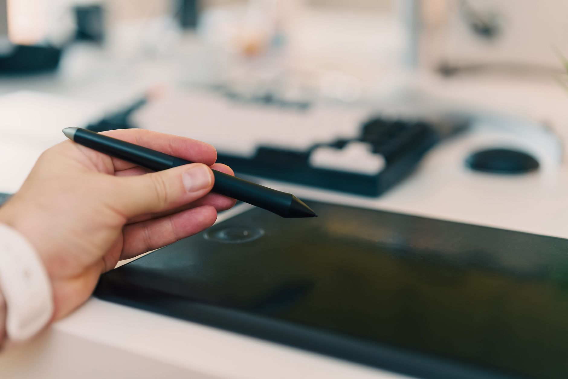 Using a stylus on digital tablet for creative design workflow