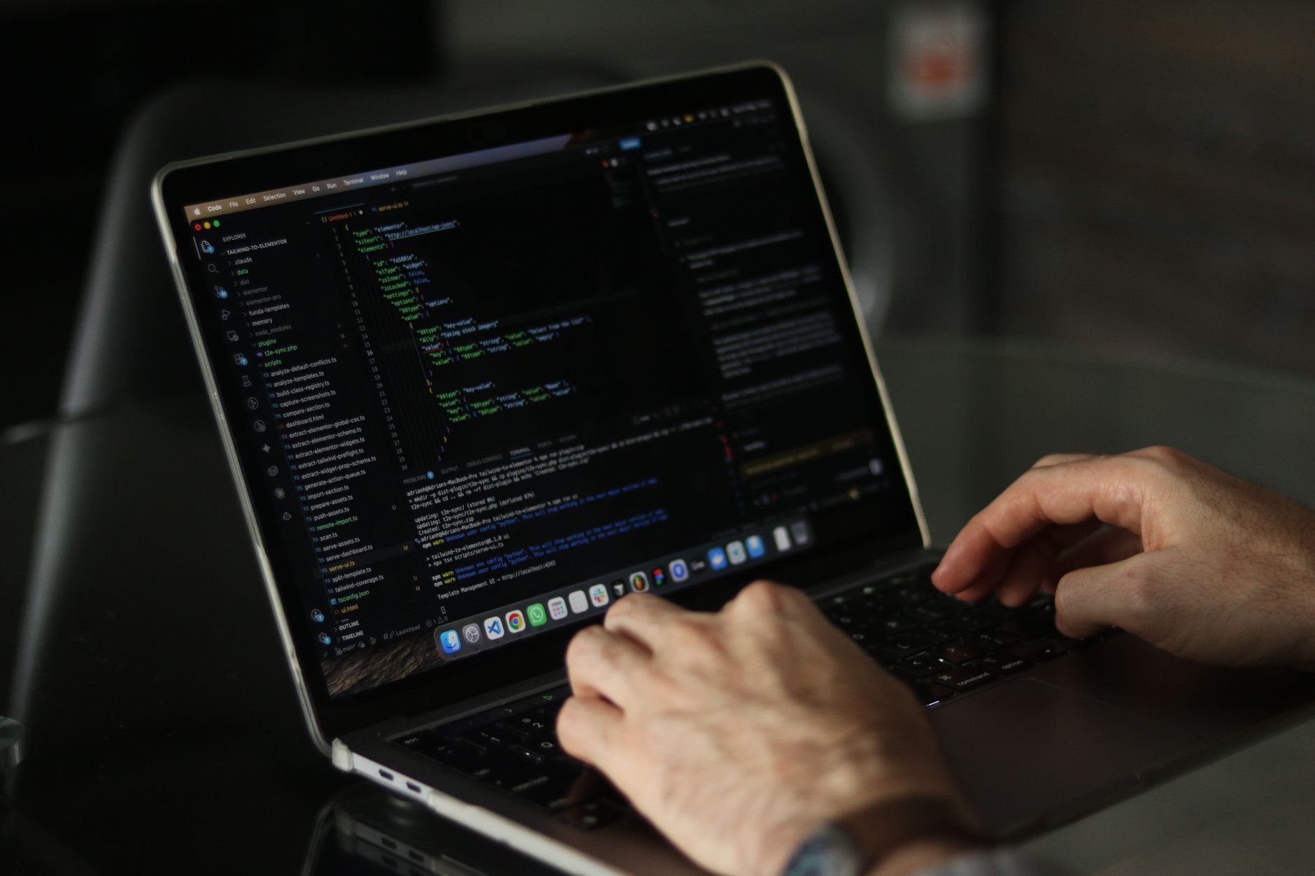 Lovable AI Review 2026: Build Full-Stack Apps Without Writing Code (Honest Review for Indian Developers) Developer reviewing and editing AI-generated code on a laptop