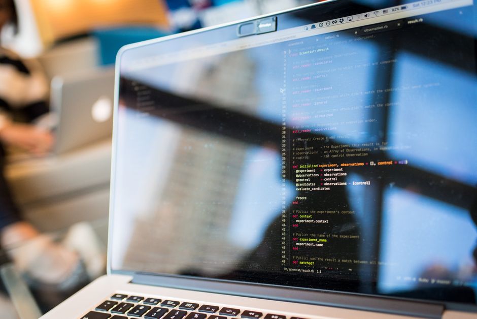 Claude AI Review 2026: Is Anthropic's Claude the Best AI Assistant for Indian Students and Professionals? Laptop displaying programming code for AI assistant productivity