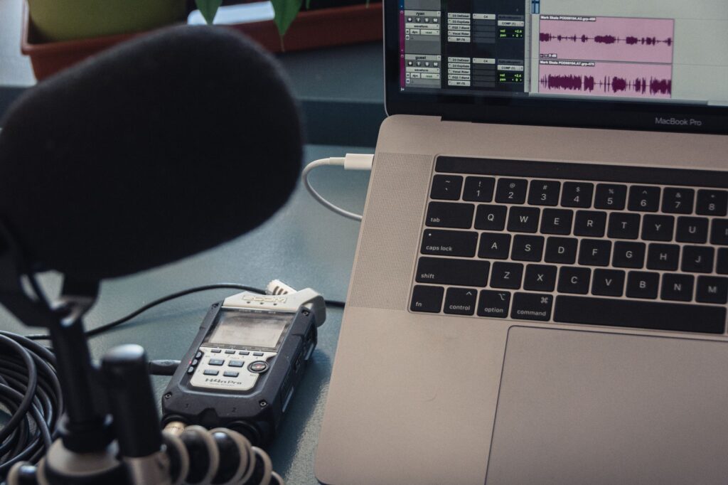 Best AI Transcription Tools in 2026: Whisper vs Otter.ai vs Notta vs Rev for Indian Users Microphone and laptop setup for AI transcription tools review 2026