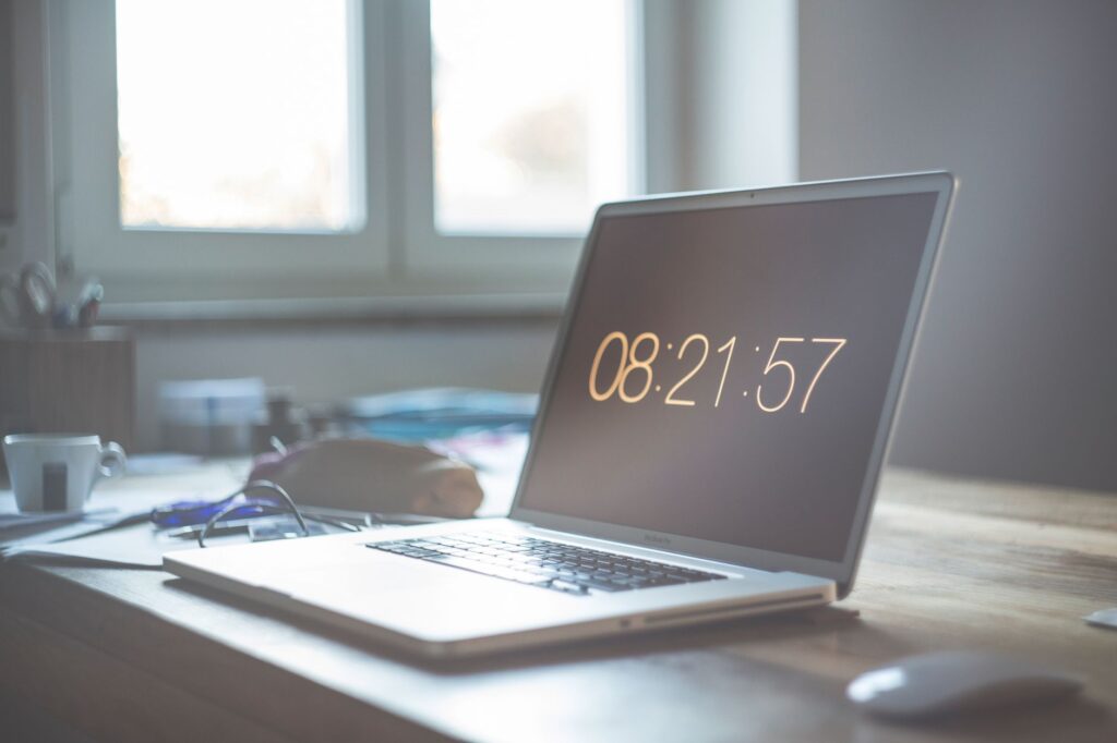 Time tracking productivity laptop workspace - best time tracking tools 2026
