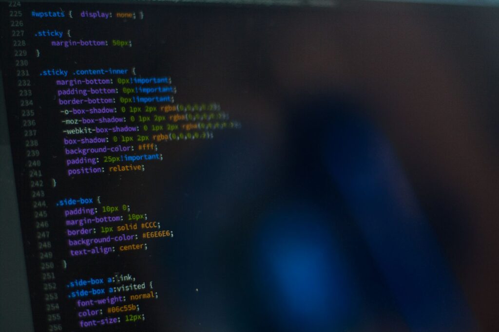 Best AI App Builders in 2026: Bolt.new vs v0.dev vs Lovable vs Replit Agent for Indian Developers CSS code on computer monitor representing AI app builder development