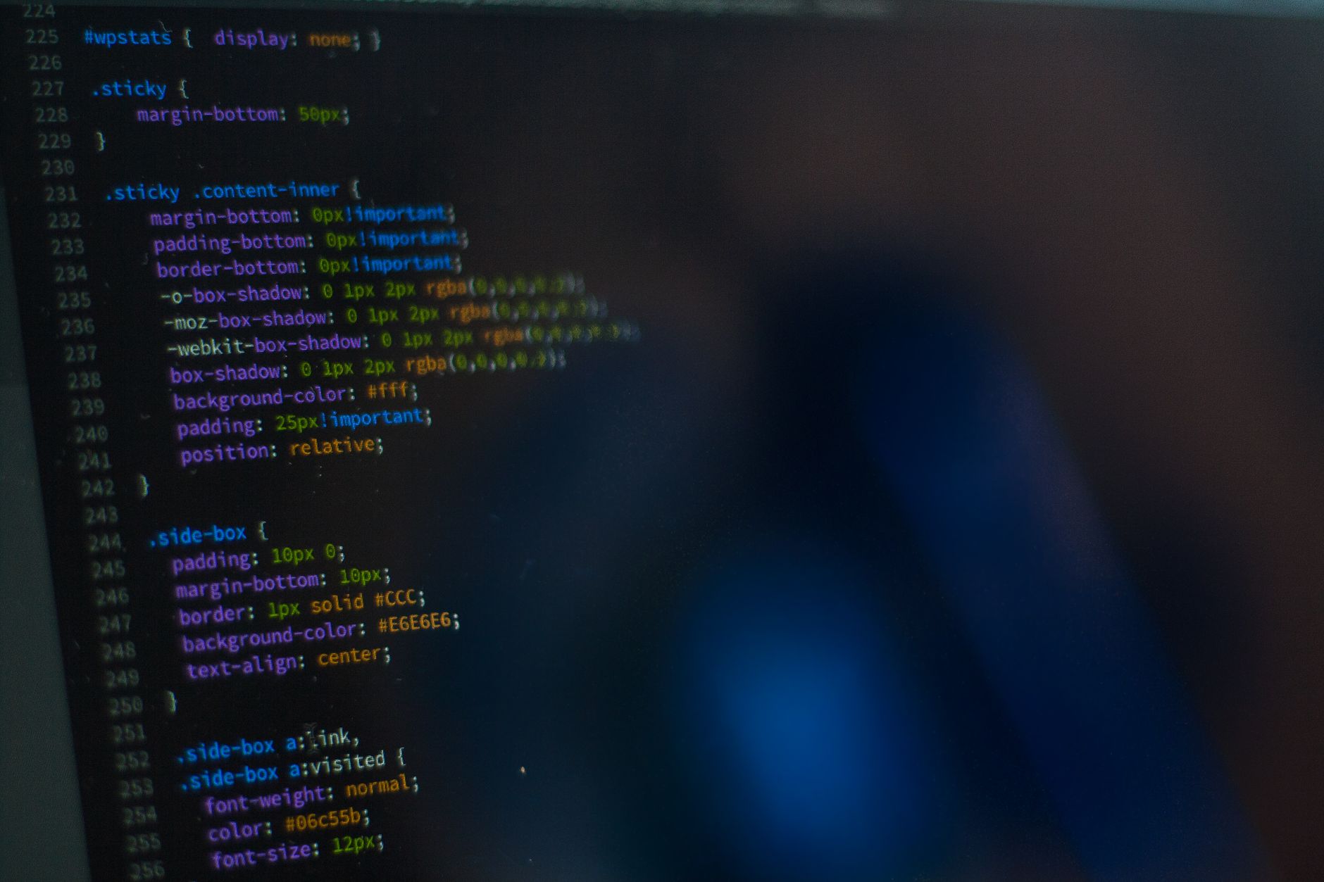 AI app builder development code on computer monitor - best AI app builders 2026