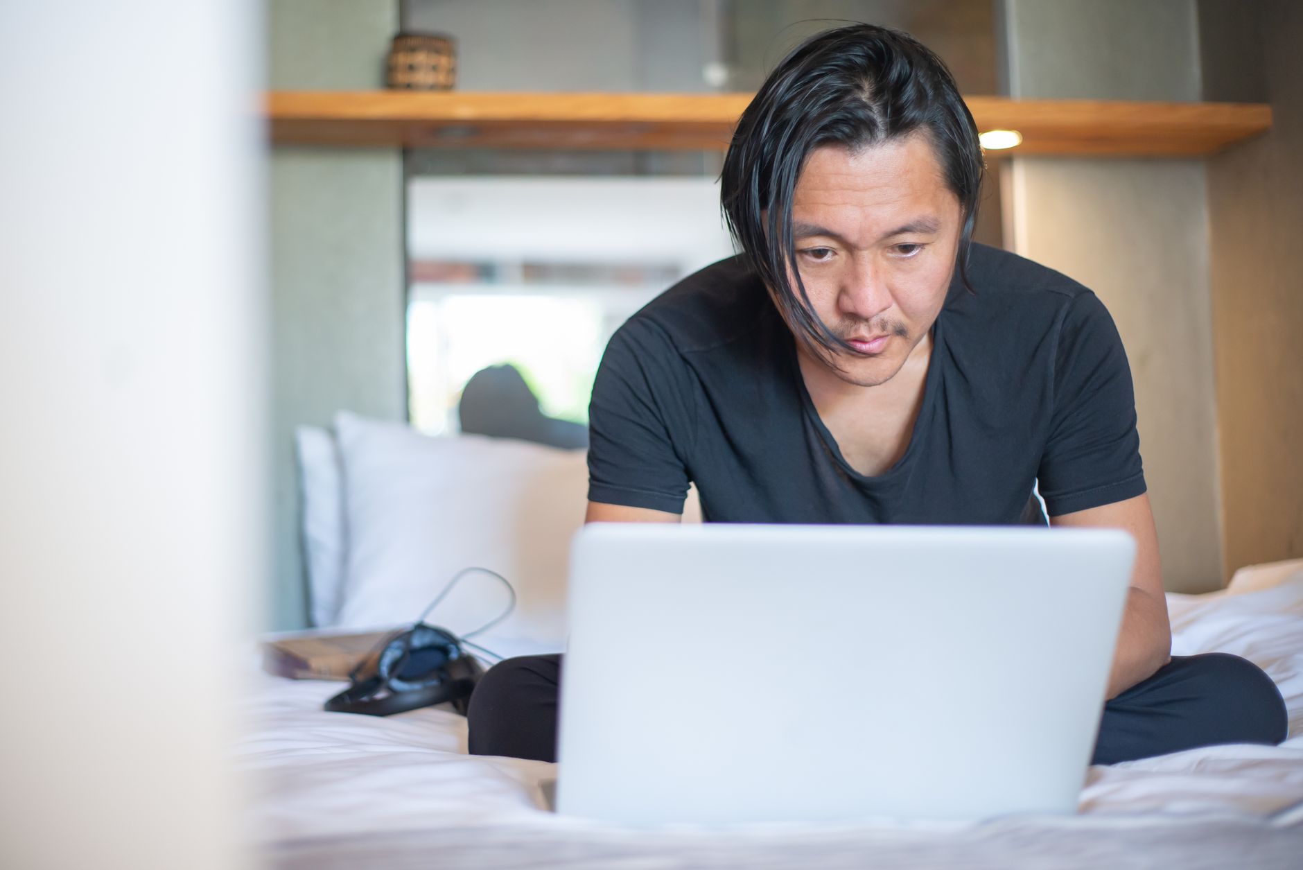 Freelancer working from home on laptop tracking time - best time tracking tools for Indian freelancers 2026