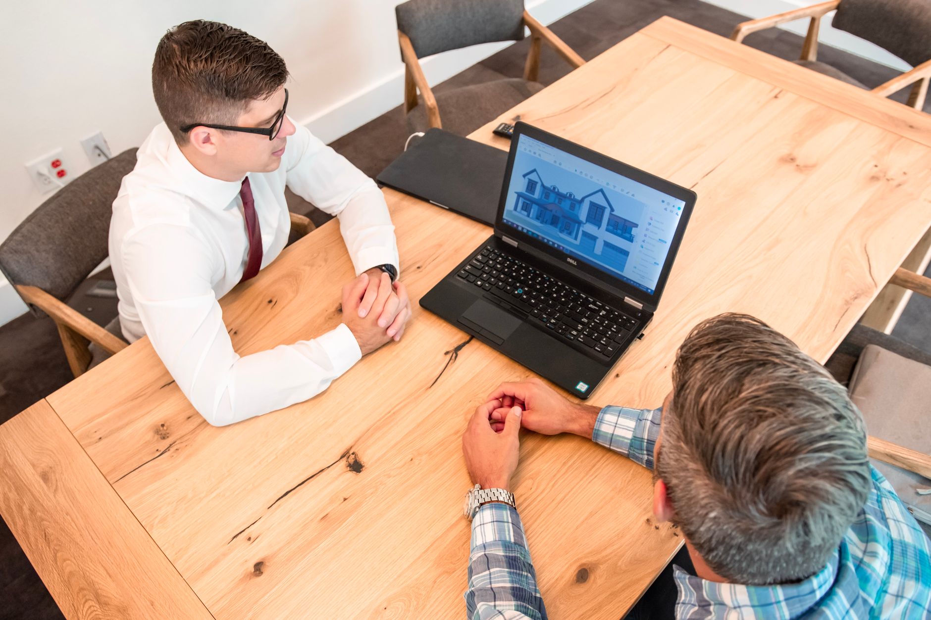 Best Free CRM Tools in 2026: HubSpot vs Zoho CRM vs Bitrix24 vs Freshsales for Indian Small Businesses Business professionals using CRM software on laptop to manage customer relationships and sales pipeline
