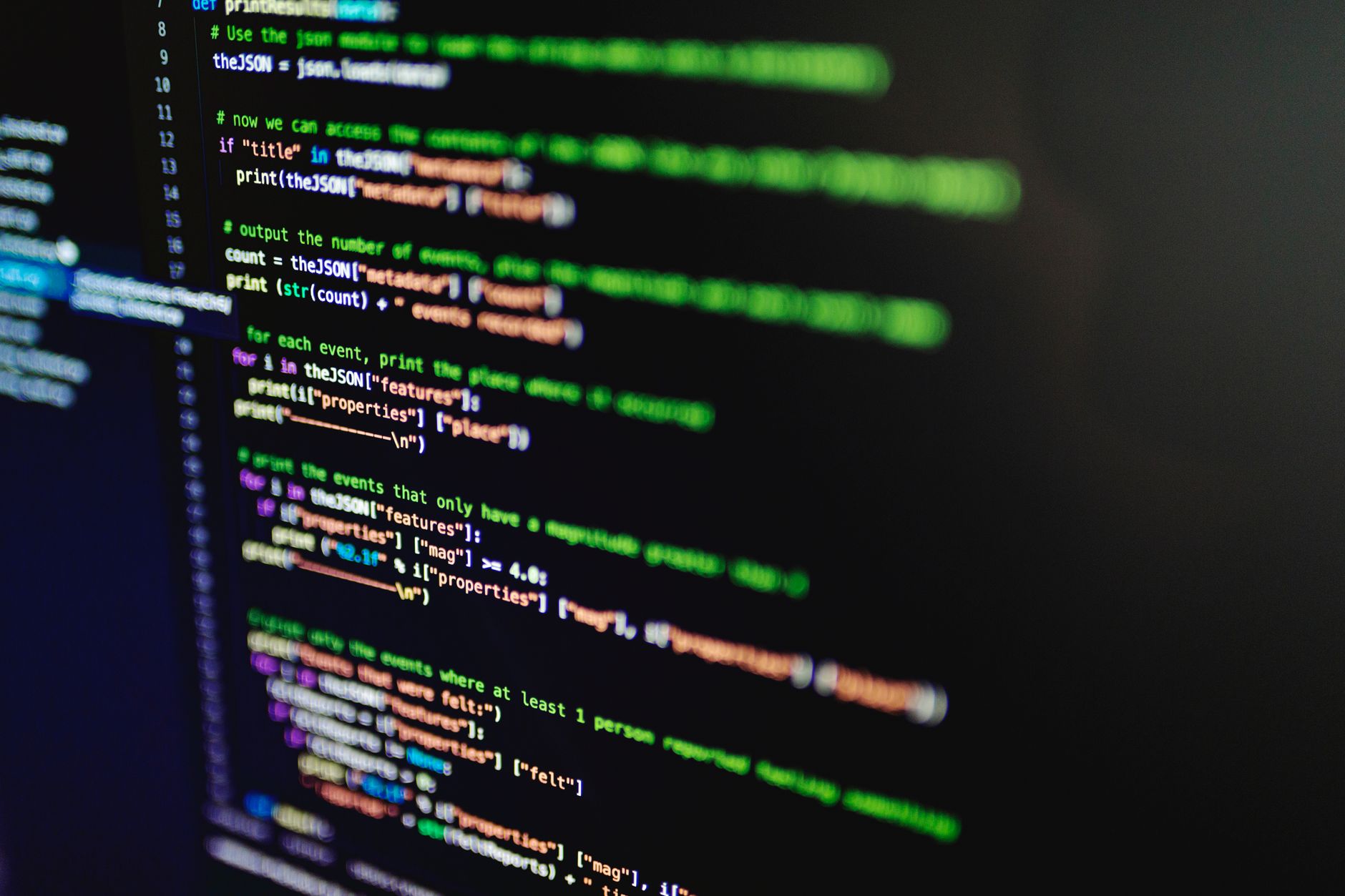 High-resolution image of colorful programming code highlighted on a computer screen showing CI/CD pipeline automation