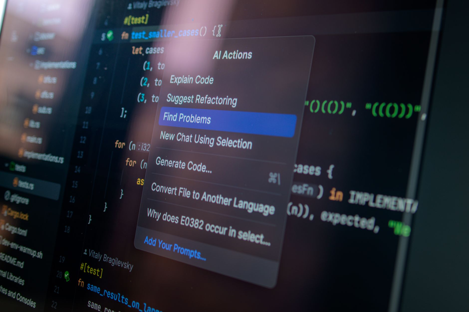 Best Automation Tools 2026: Zapier, Make, n8n Detailed view of a computer screen displaying code with a menu of AI actions, illustrating modern software development.