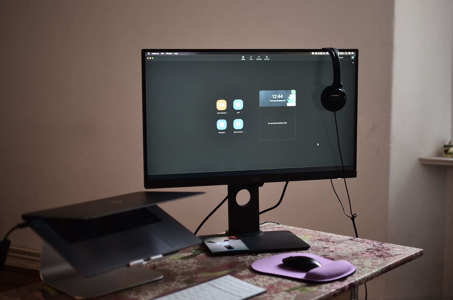 Tailscale vs ZeroTier vs Cloudflare Tunnel Home office computer setup with remote work equipment and laptop keyboard