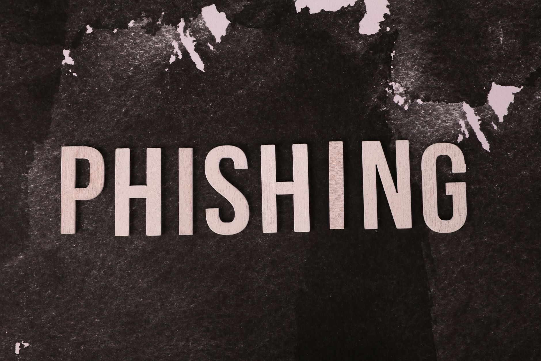 Proton Mail vs Tuta vs Fastmail in 2026: Best Secure Email for US Professionals Abstract representation of phishing and email security threats on a dark surface