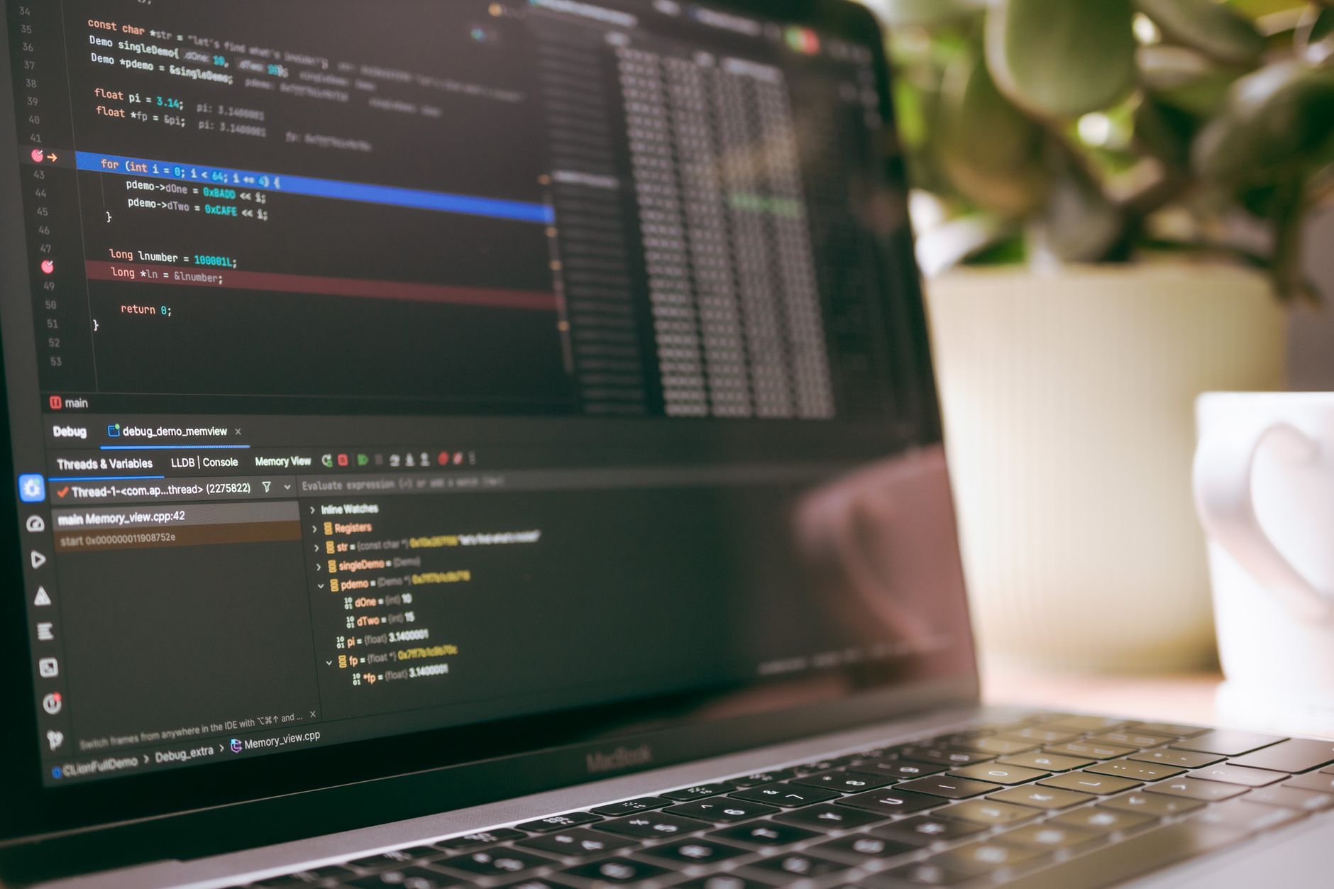 A laptop screen showing programming code and debugging tools, ideal for tech topics